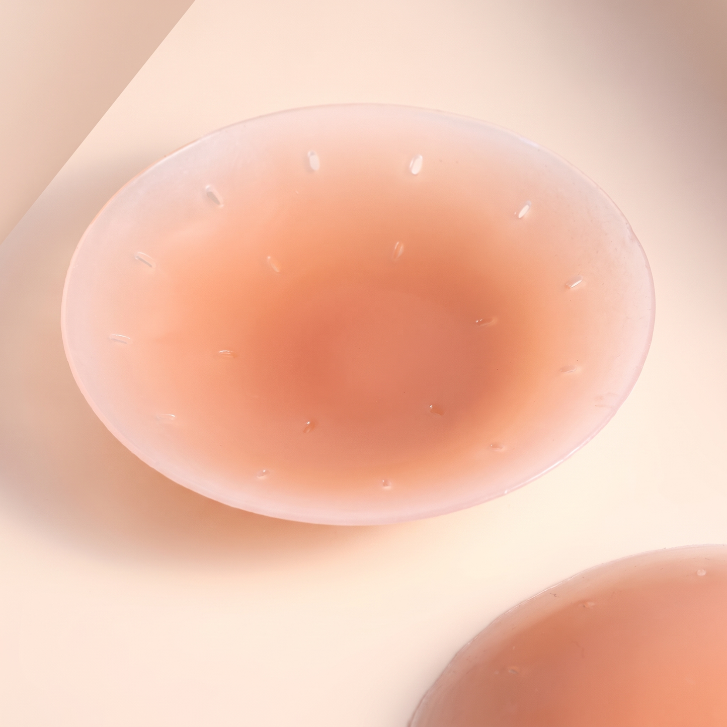 NipEase ultra-thin translucent silicone nipple cover, macro close-up
